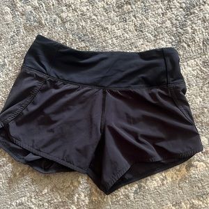 Lululemon Speed Up Low-Rise Lined Shorts size 4 in black.